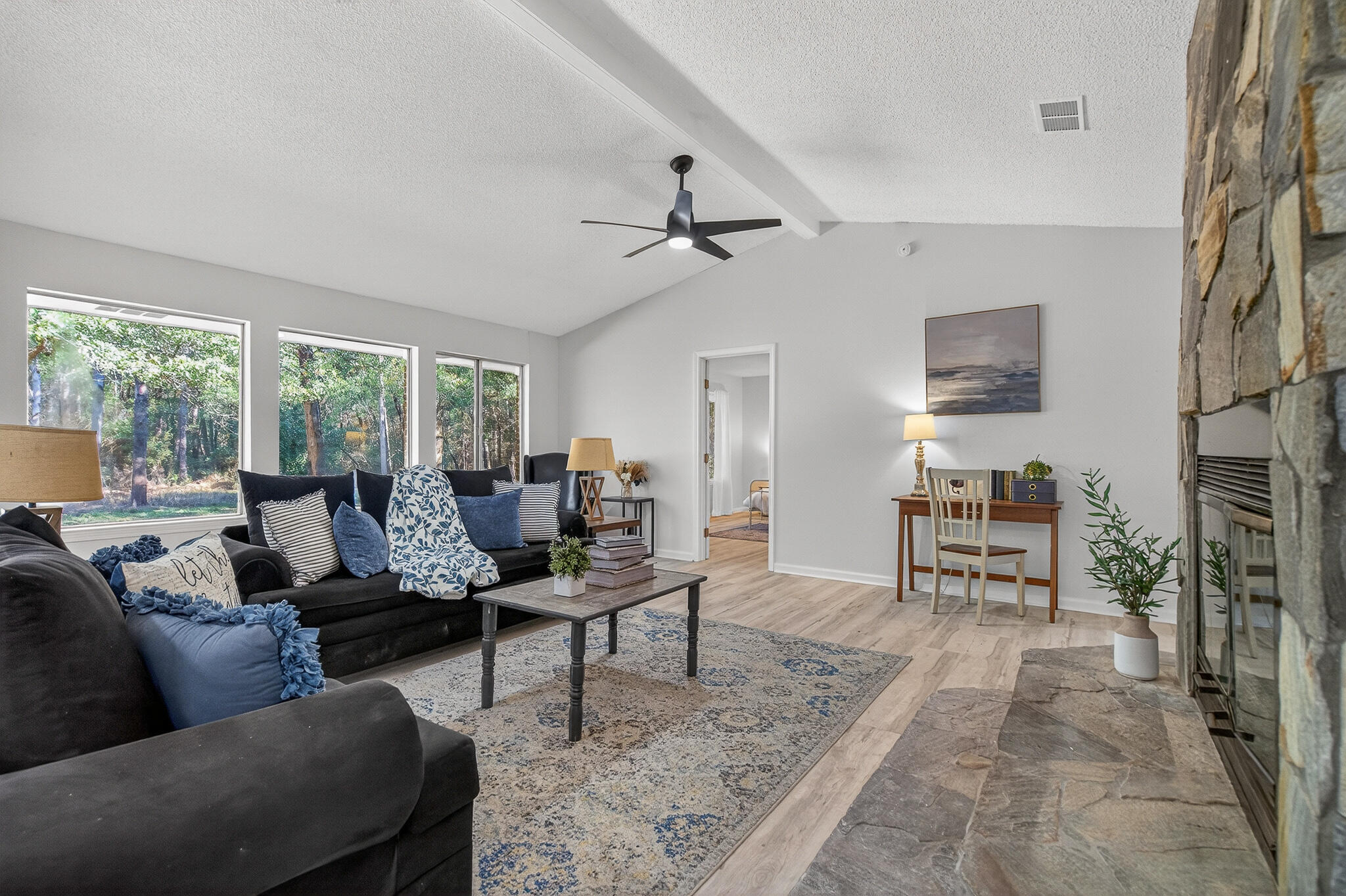 4297 Edge Perry Road Crestview, FL 32539 - Photo 22 of 70 a living room with furniture and a large window