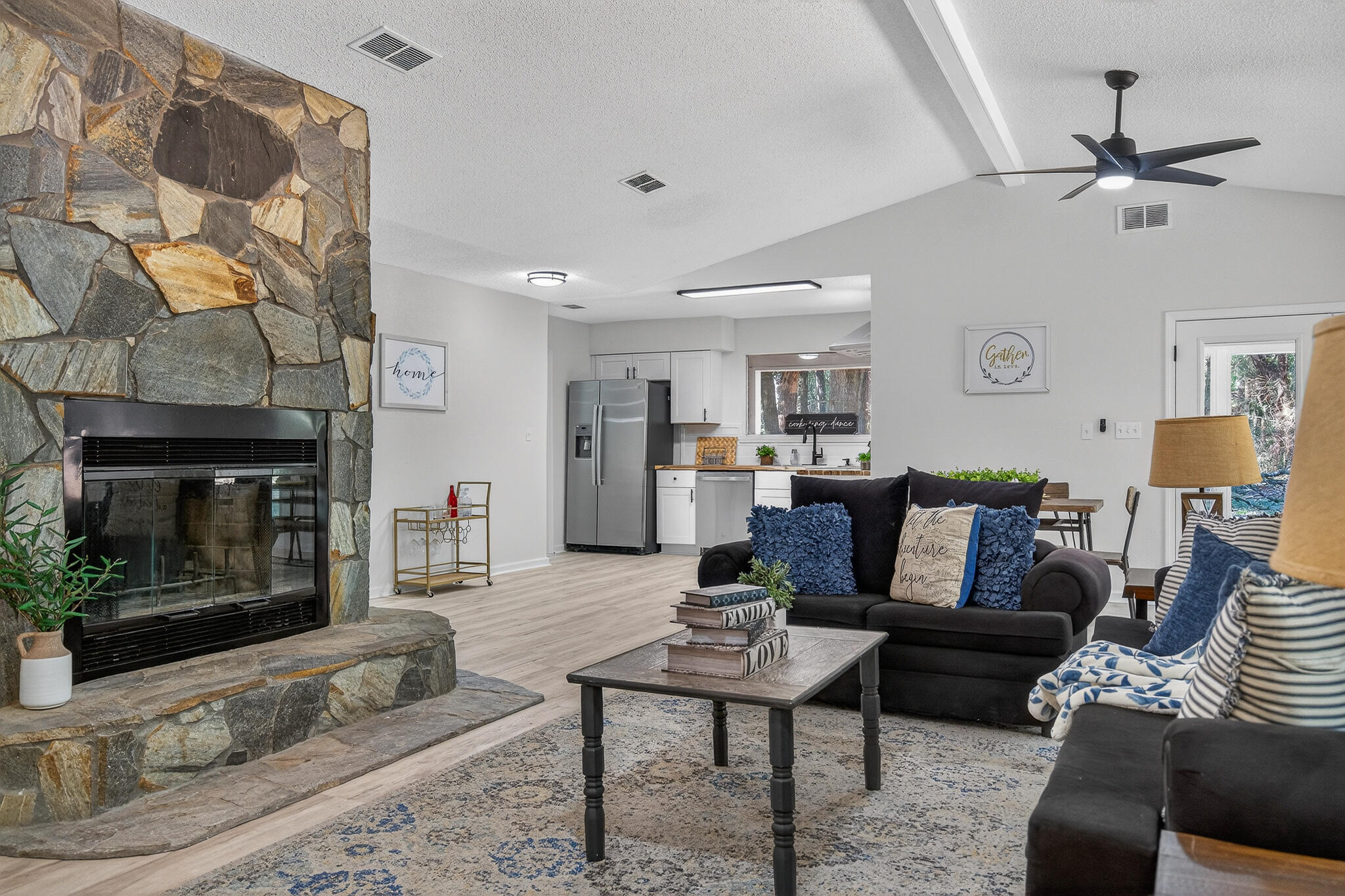 4297 Edge Perry Road Crestview, FL 32539 - Photo 23 of 70 a living room with furniture and a fireplace
