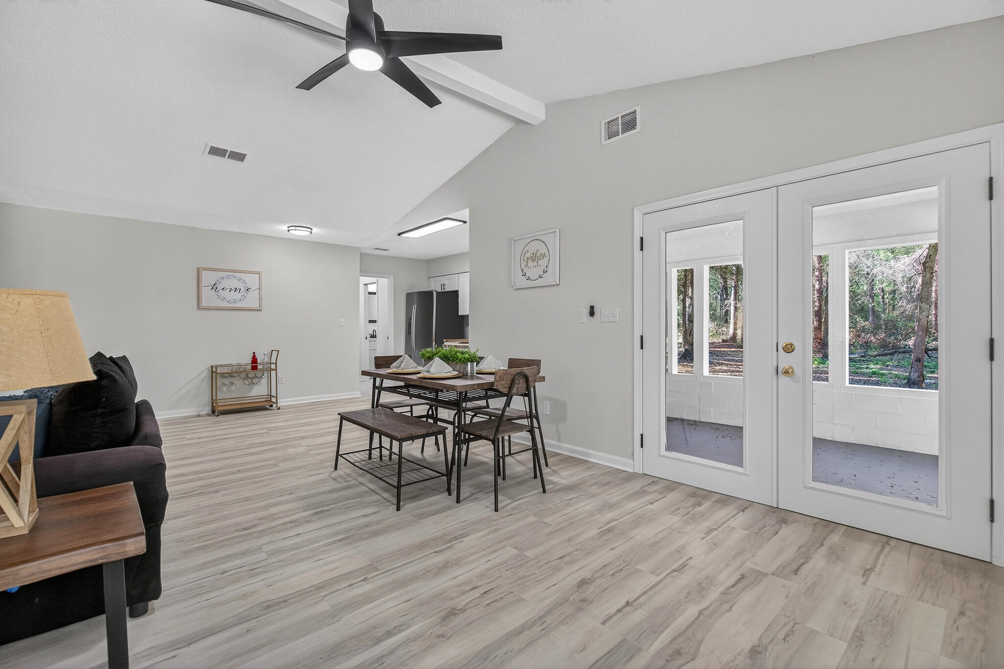 4297 Edge Perry Road Crestview, FL 32539 - Photo 26 of 70 a living room with furniture and a wooden floor
