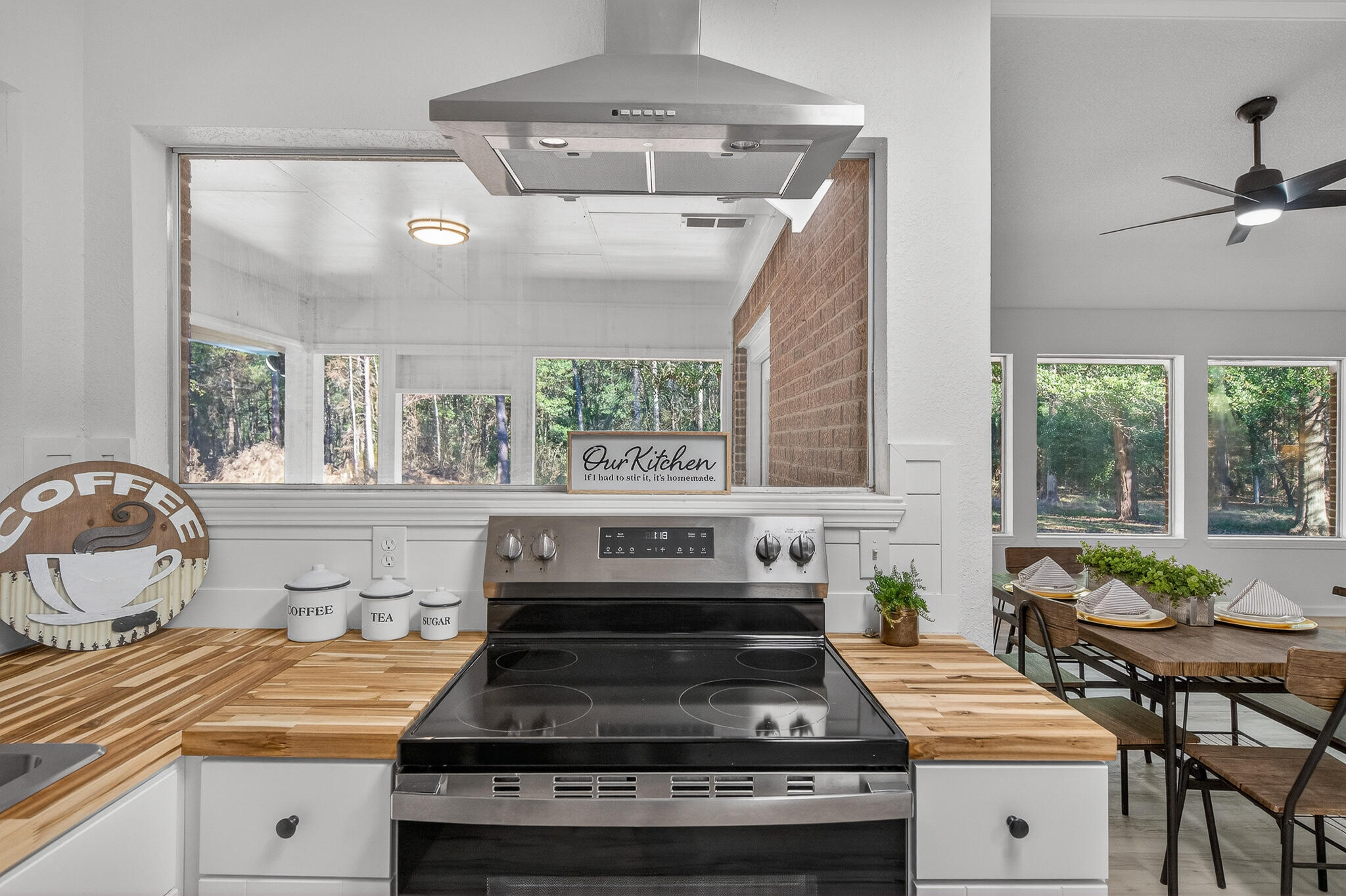 4297 Edge Perry Road Crestview, FL 32539 - Photo 35 of 70 a kitchen with a stove and a window