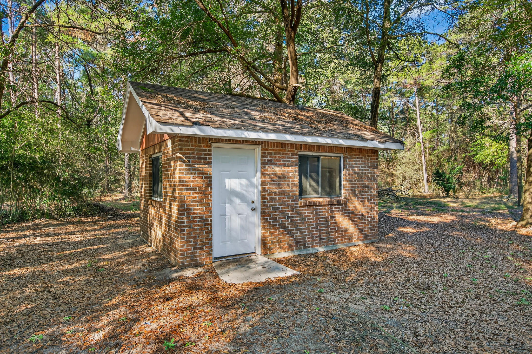 4297 Edge Perry Road Crestview, FL 32539 - Photo 66 of 70 a view of a house with a yard