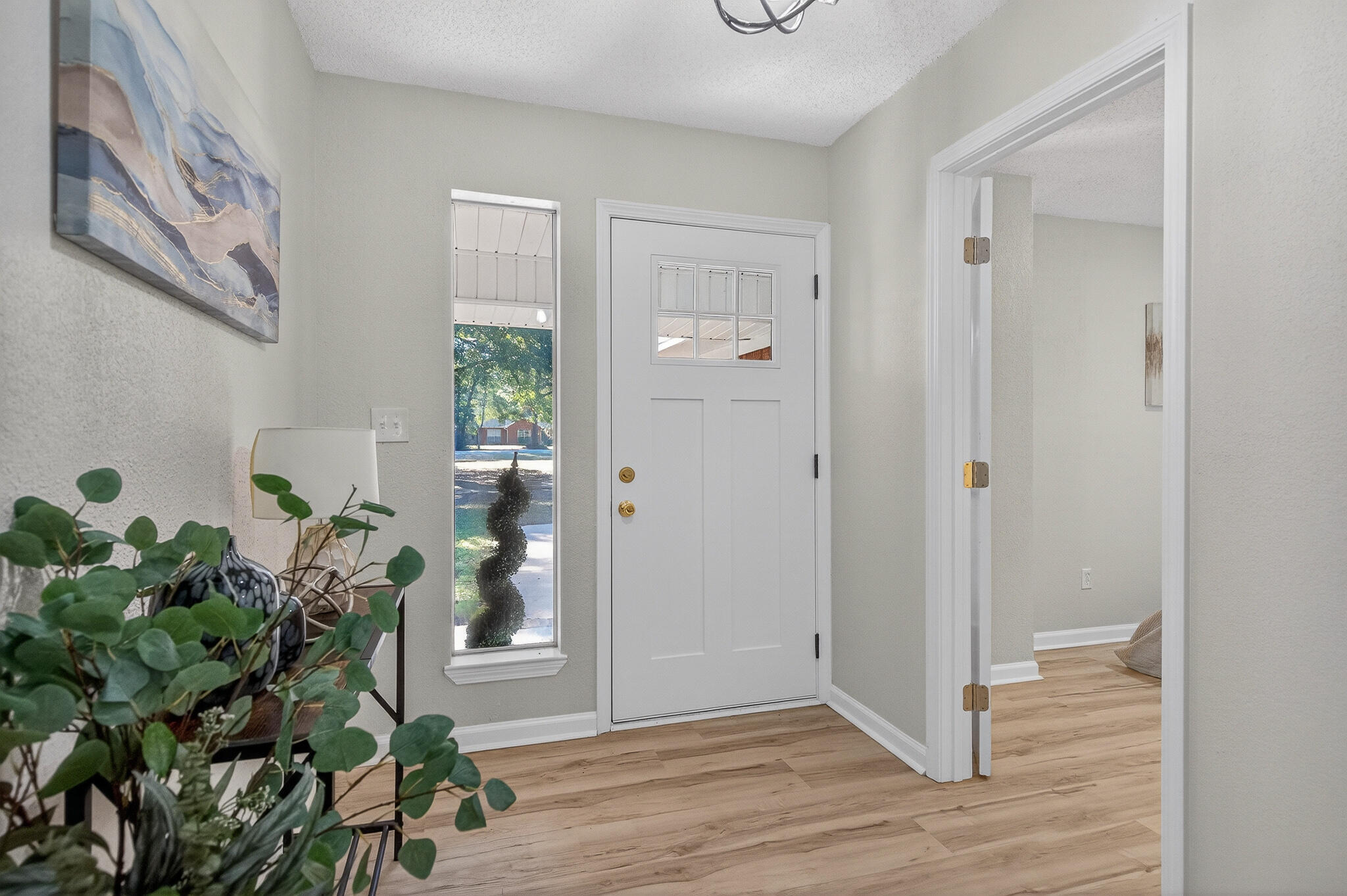 4297 Edge Perry Road Crestview, FL 32539 - Photo 8 of 70 a view of entryway with wooden floor