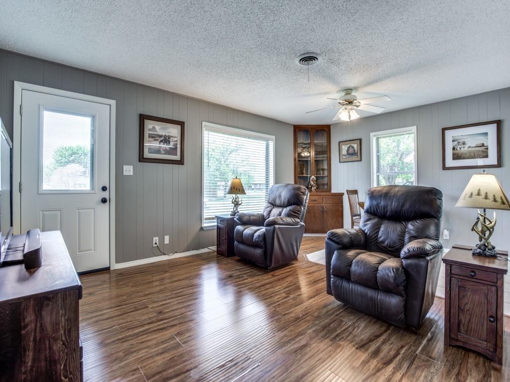 500 North 5th Street Gunter, TX 75058 - Photo 4 of 11 a living room with furniture and a wooden floor