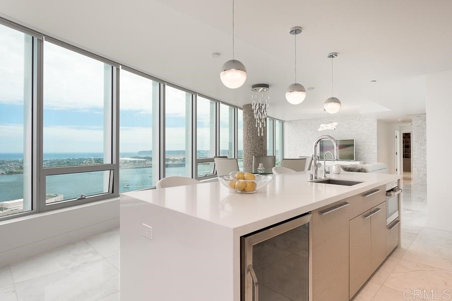 888 West E Street San Diego, CA 92101 - Photo 6 of 30 a kitchen with a sink and large window