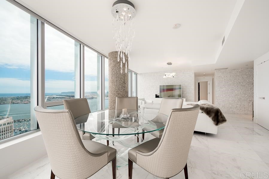 888 West E Street San Diego, CA 92101 - Photo 8 of 30 a view of a dining room with furniture window and outside view