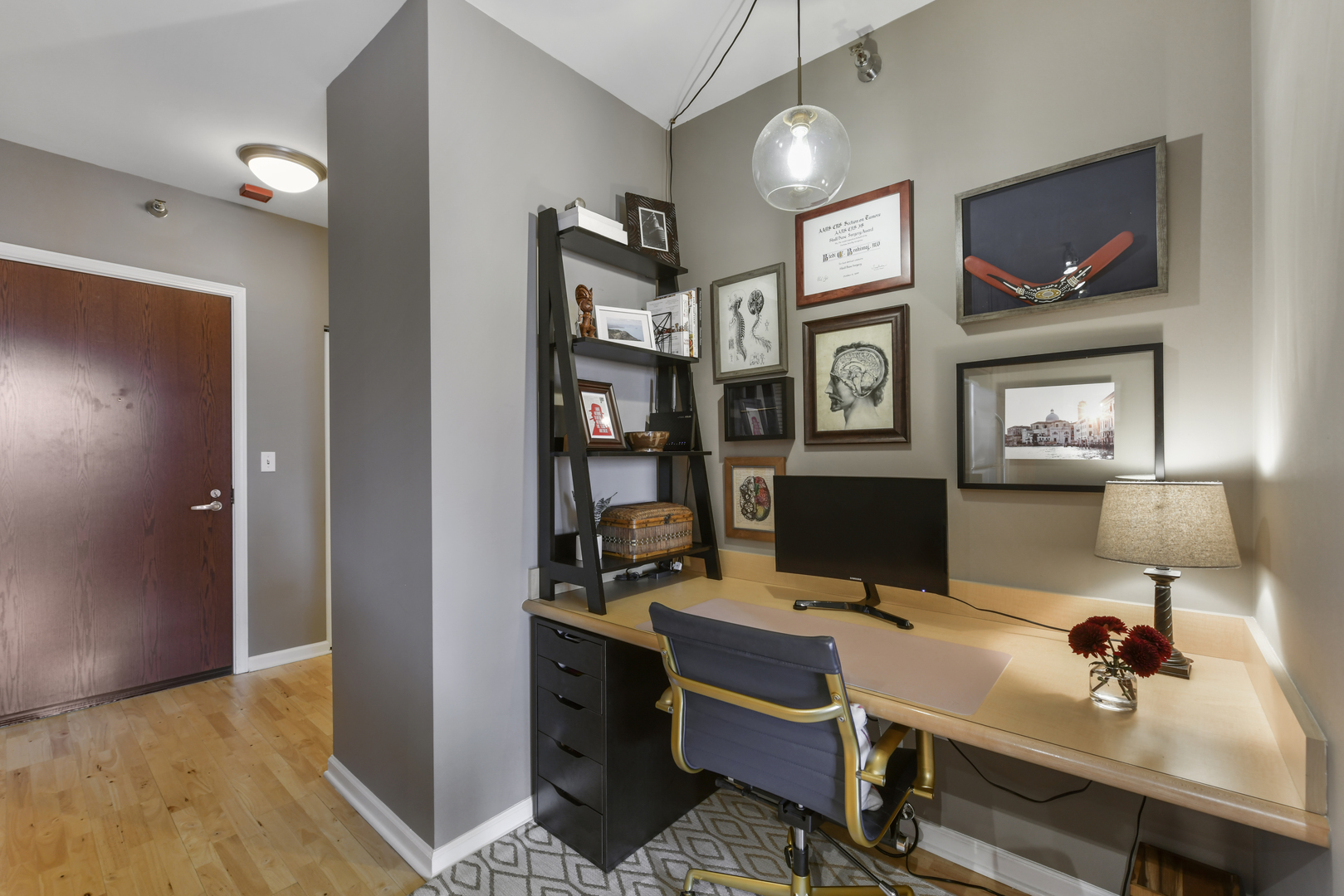 1255 South State Street, Unit 807 Chicago, IL 60605 - Photo 8 of 13 a view of a workspace with furniture