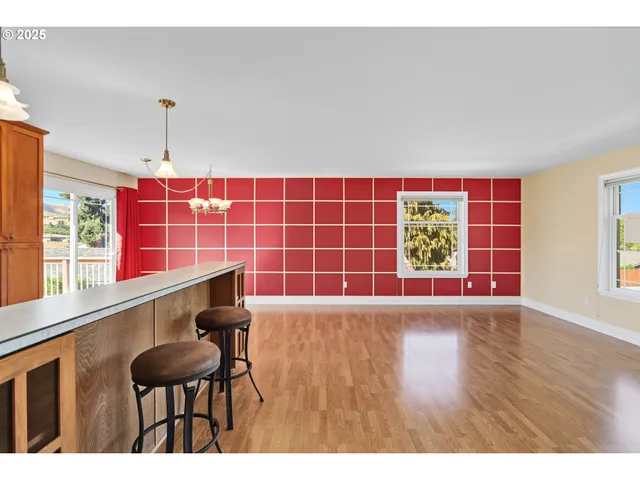 a view of a living room and a window