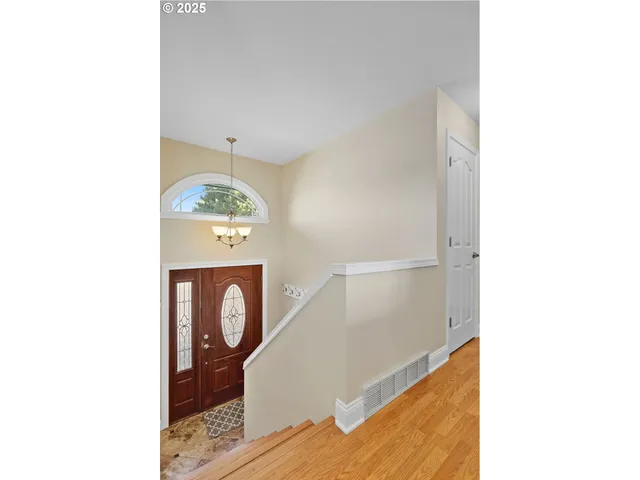 a picture of a bathroom with a sink and a mirror