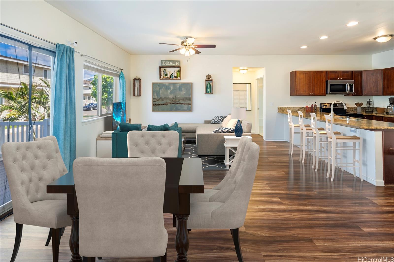 a living room with furniture wooden floor and a flat screen tv