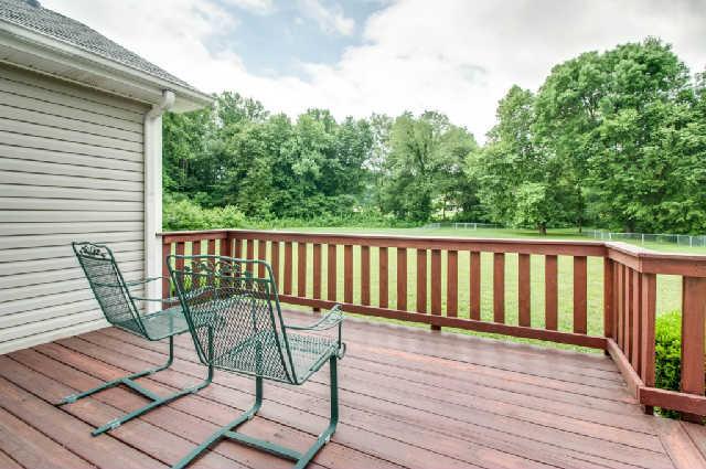 1027 Heatherwood Road Pleasant View, TN 37146 - Photo 13 of 15 Deck is off the great room overlooking a really deep back yard and it is fully fenced.