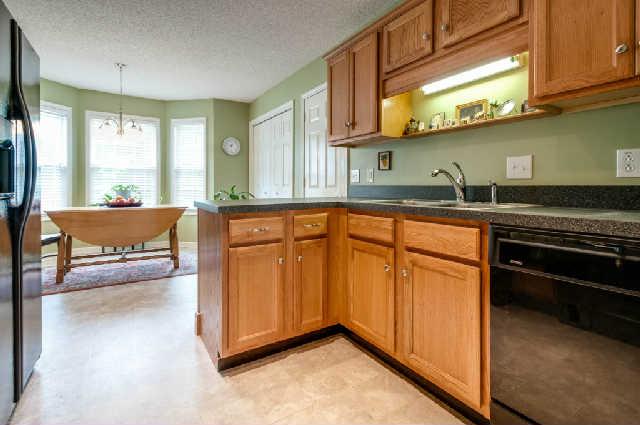 1027 Heatherwood Road Pleasant View, TN 37146 - Photo 6 of 15 Looking back into the fully equipped kitchen from the dining room.