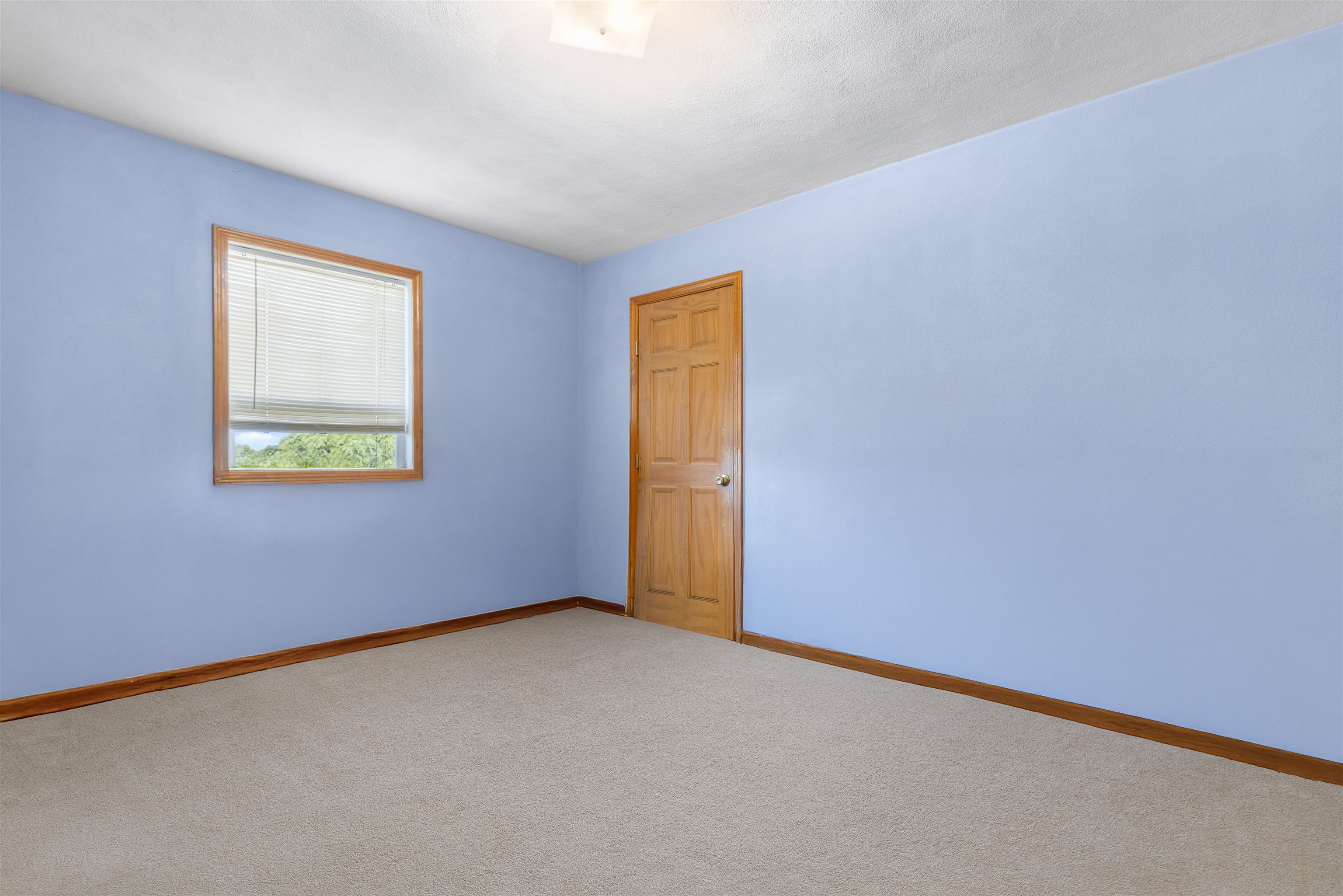 1405 Sentry Drive Durand, IL 61024 - Photo 11 of 25 a view of an empty room with a window