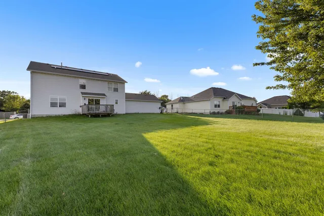 a view of a golf course with a lake