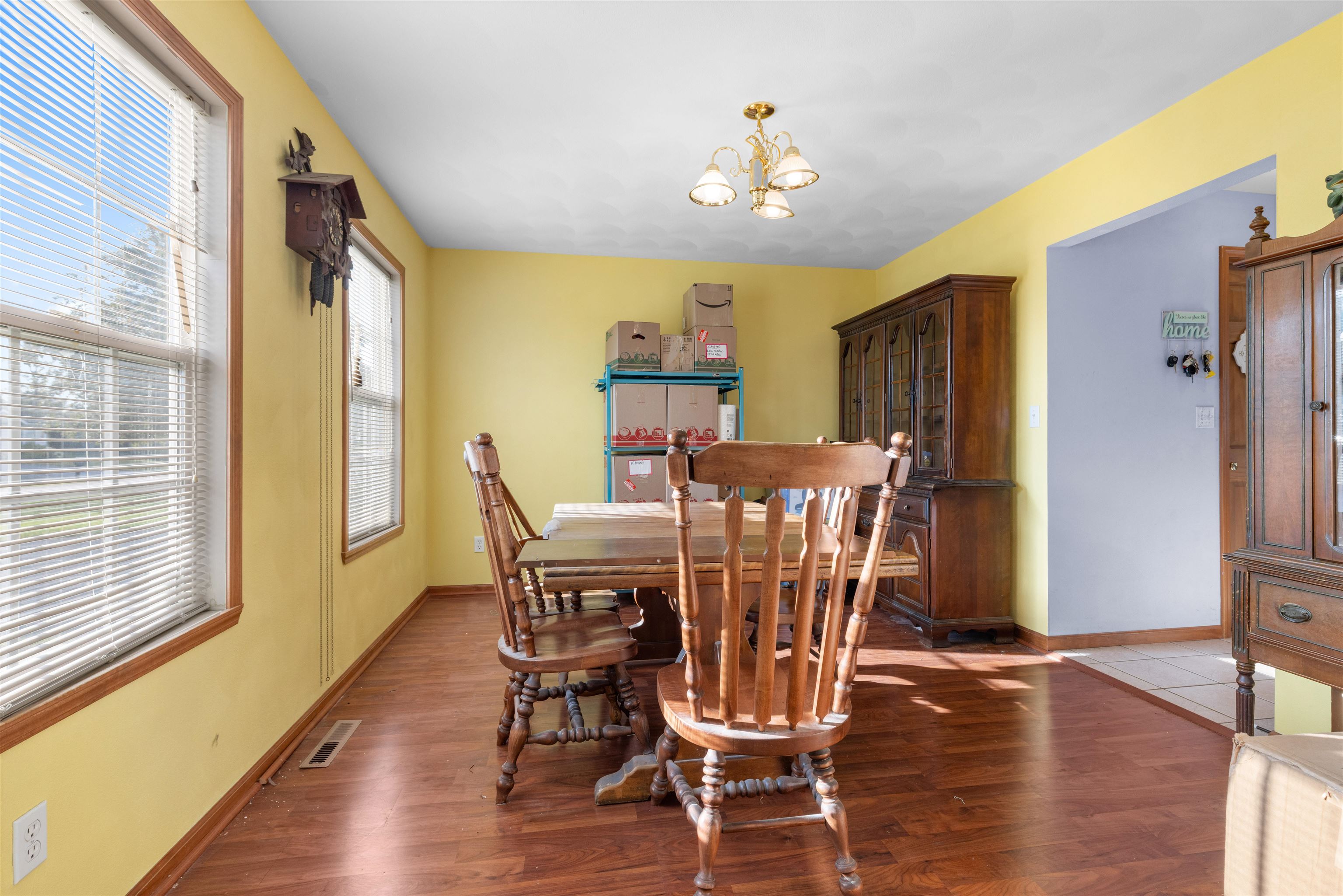 1405 Sentry Drive Durand, IL 61024 - Photo 6 of 25 a view of a dining room with furniture window and wooden floor