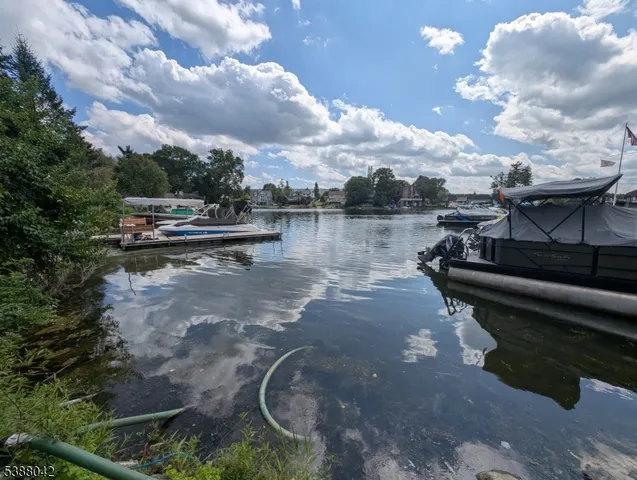 a front view of a house with swimming pool