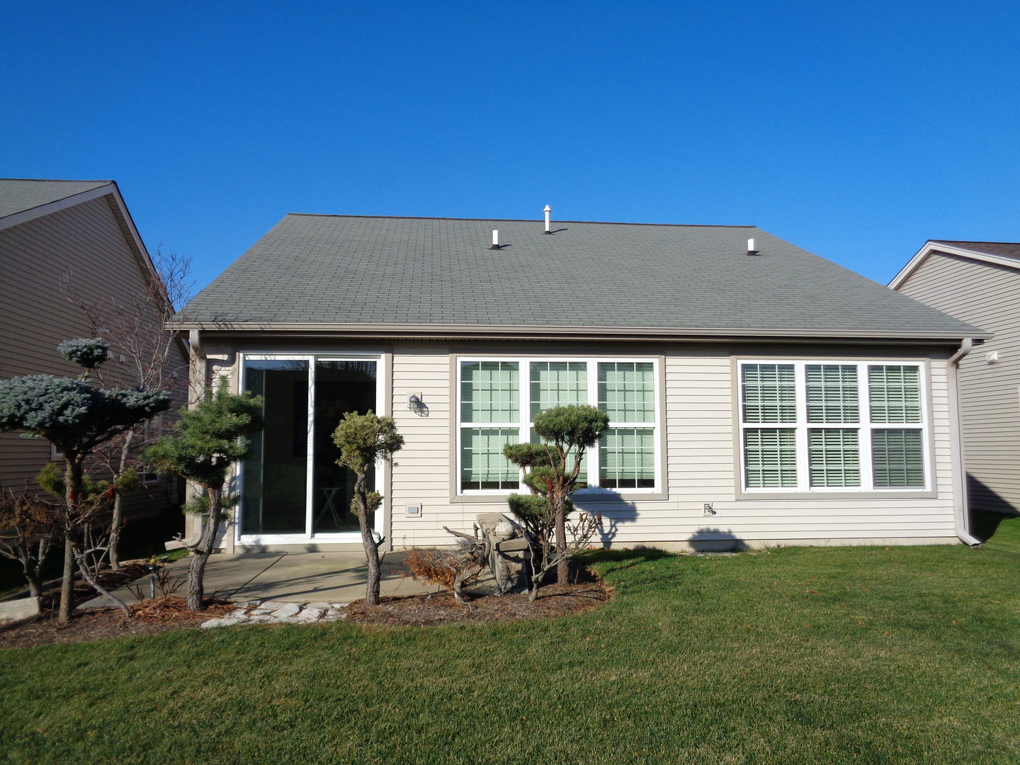 2459 Rolling Ridge Elgin, IL 60124 - Photo 14 of 22 a house view with a sitting space and garden