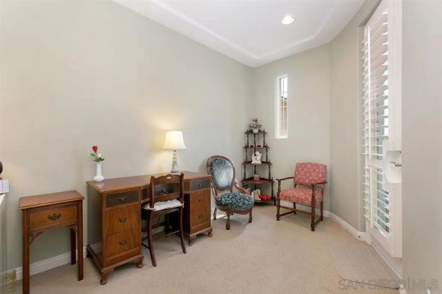 a view of a workspace with furniture