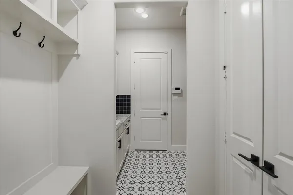 a bathroom with a sink and a shower