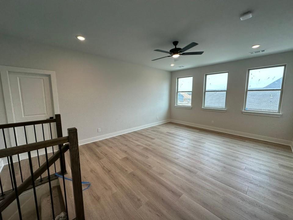 330 Cobb Road Leonard, TX 75452 - Photo 17 of 26 Spare room featuring light wood-style floors, recessed lighting, and ceiling fan