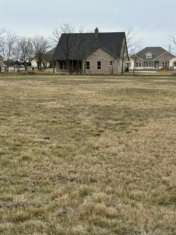 a front view of house with yard
