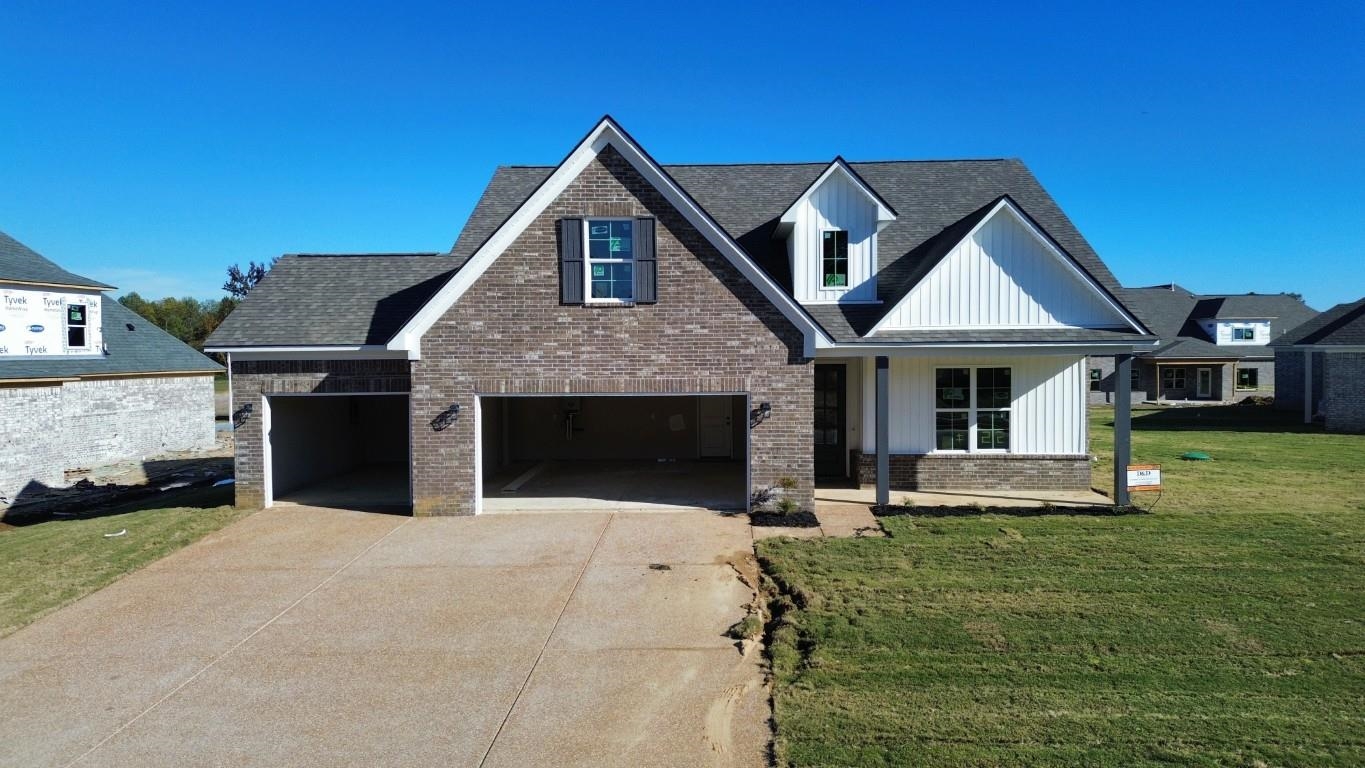170 Como Lane Atoka, TN 38004 - Photo 1 of 27 a front view of a house with a yard