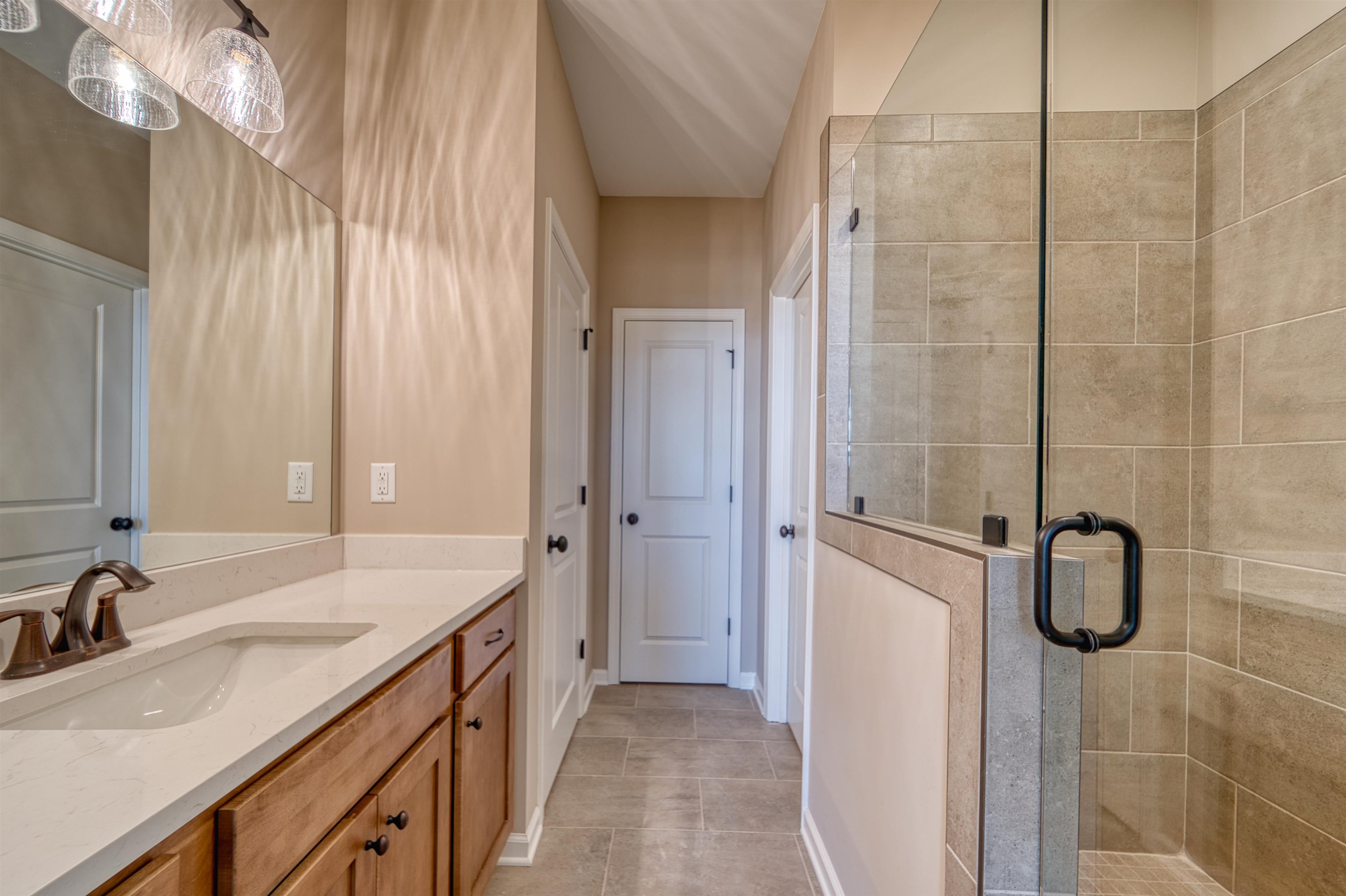 170 Como Lane Atoka, TN 38004 - Photo 11 of 40 Bathroom featuring a shower stall and vanity