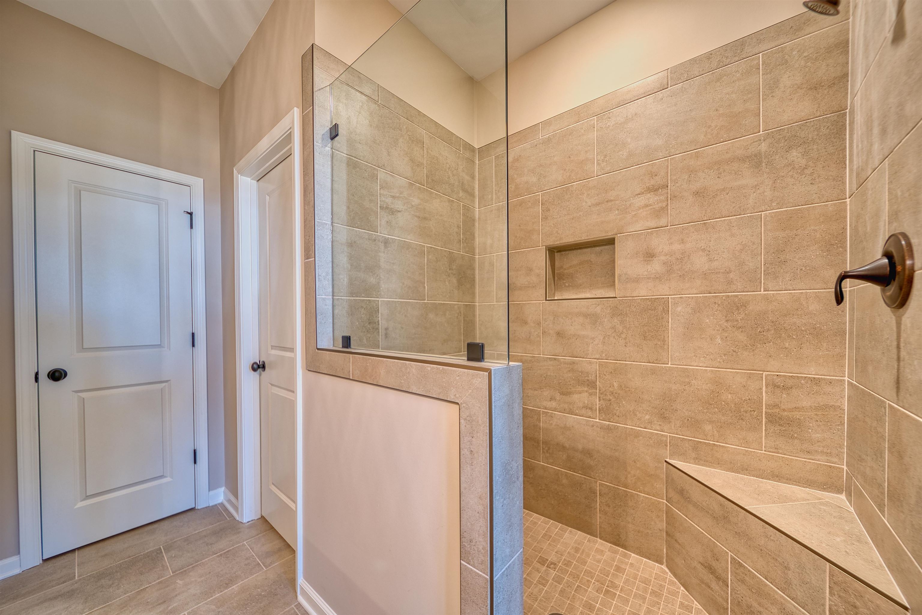 170 Como Lane Atoka, TN 38004 - Photo 12 of 40 Full bathroom with walk in shower and baseboards
