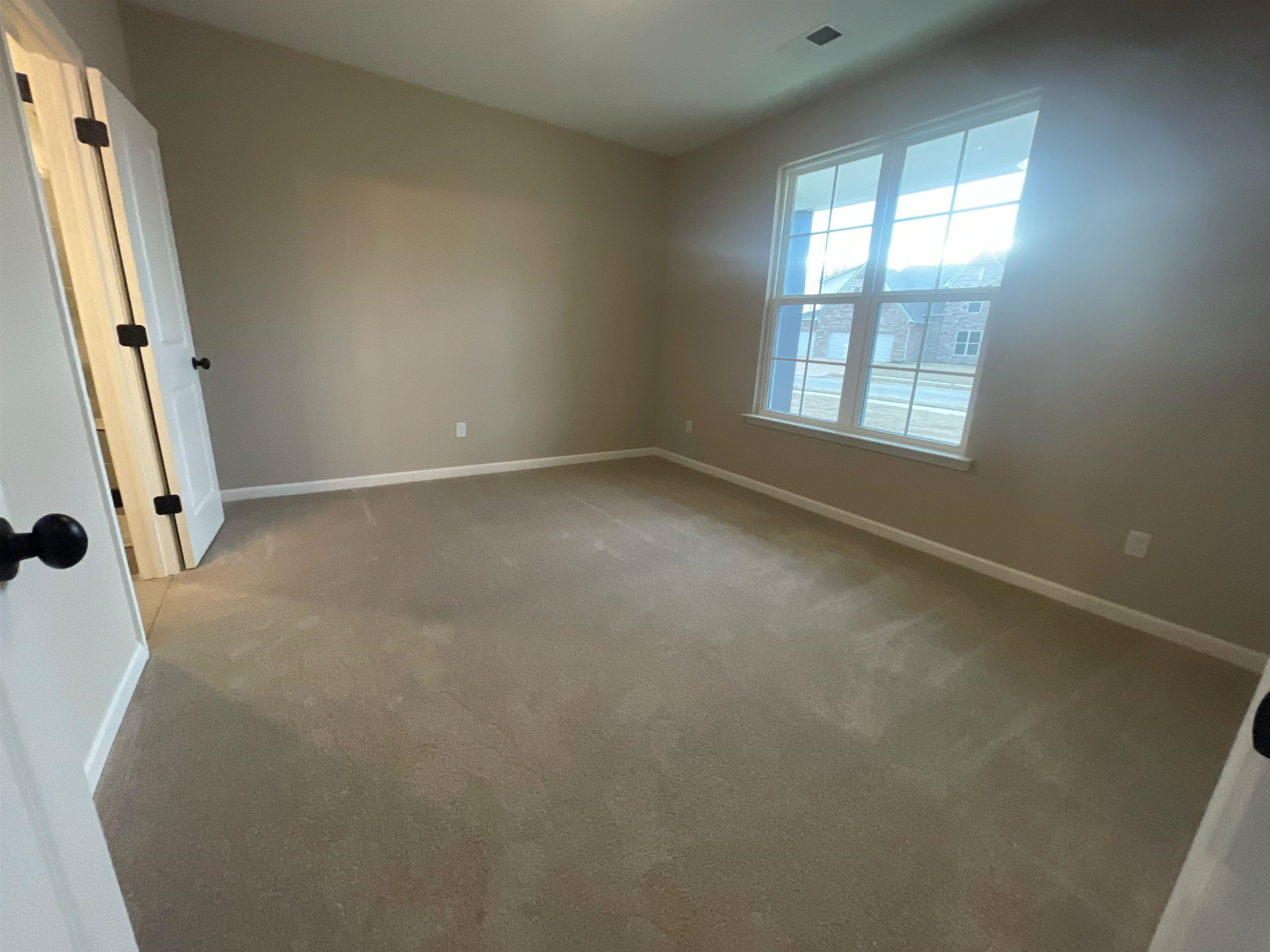 170 Como Lane Atoka, TN 38004 - Photo 17 of 27 Carpeted empty room with baseboards