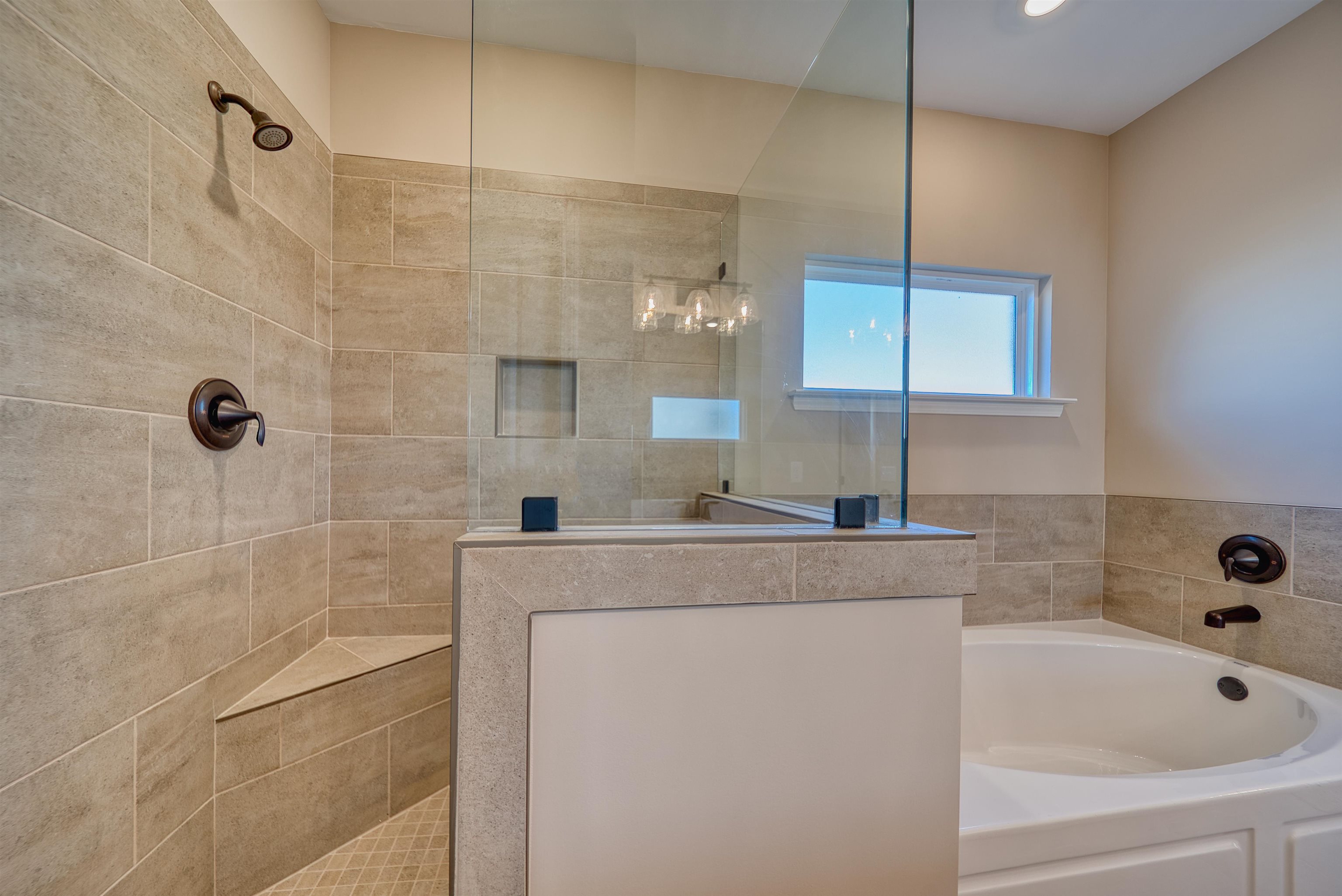170 Como Lane Atoka, TN 38004 - Photo 23 of 40 Bathroom with walk in shower and a garden tub