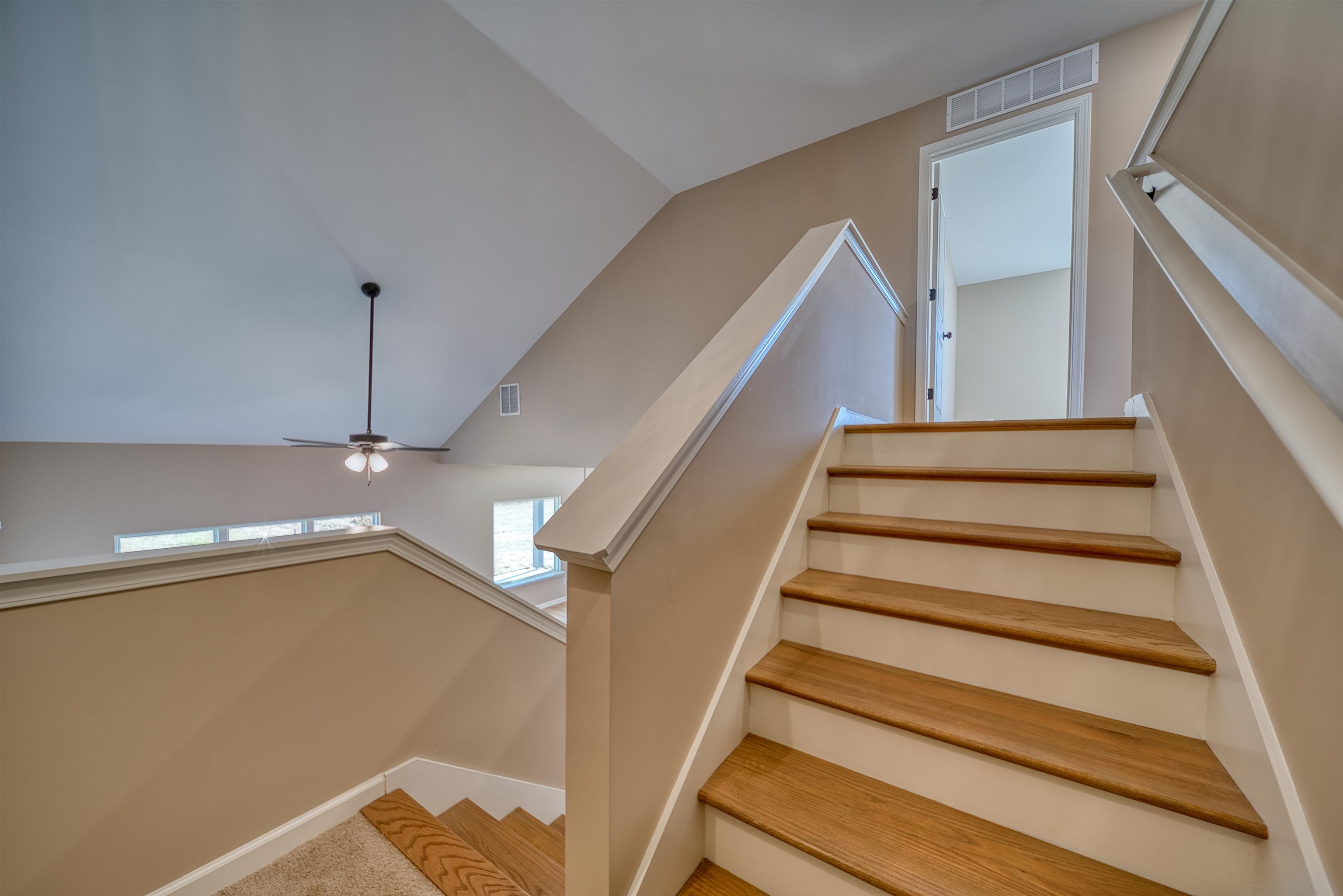 170 Como Lane Atoka, TN 38004 - Photo 26 of 40 Staircase featuring ceiling fan and carpet flooring