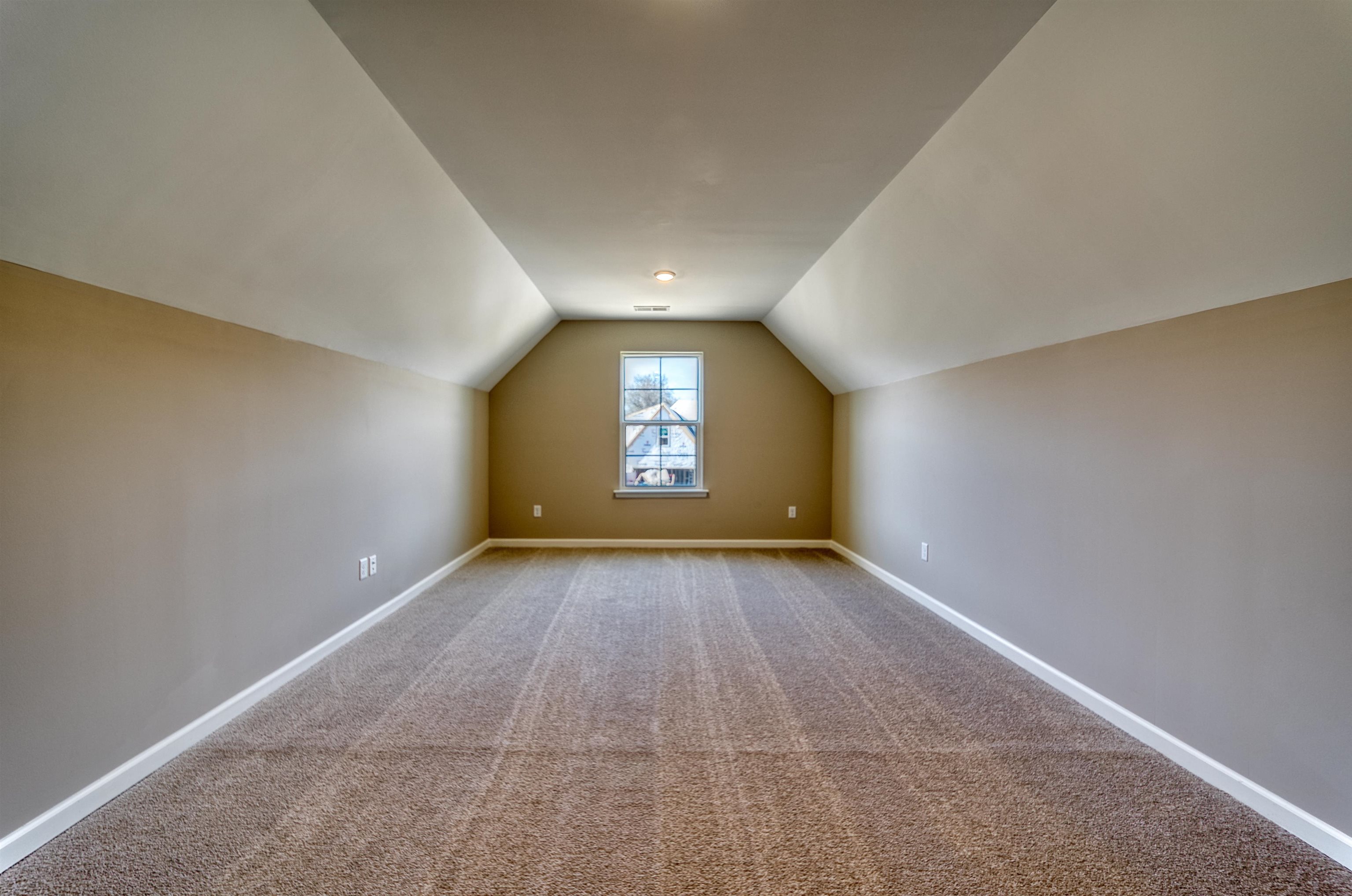 170 Como Lane Atoka, TN 38004 - Photo 31 of 40 Additional living space featuring baseboards and light colored carpet