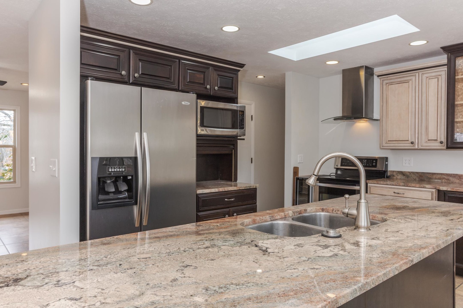 1308 Schroeder Drive Normal, IL 61761 - Photo 13 of 55 a kitchen with stainless steel appliances granite countertop a refrigerator and a sink
