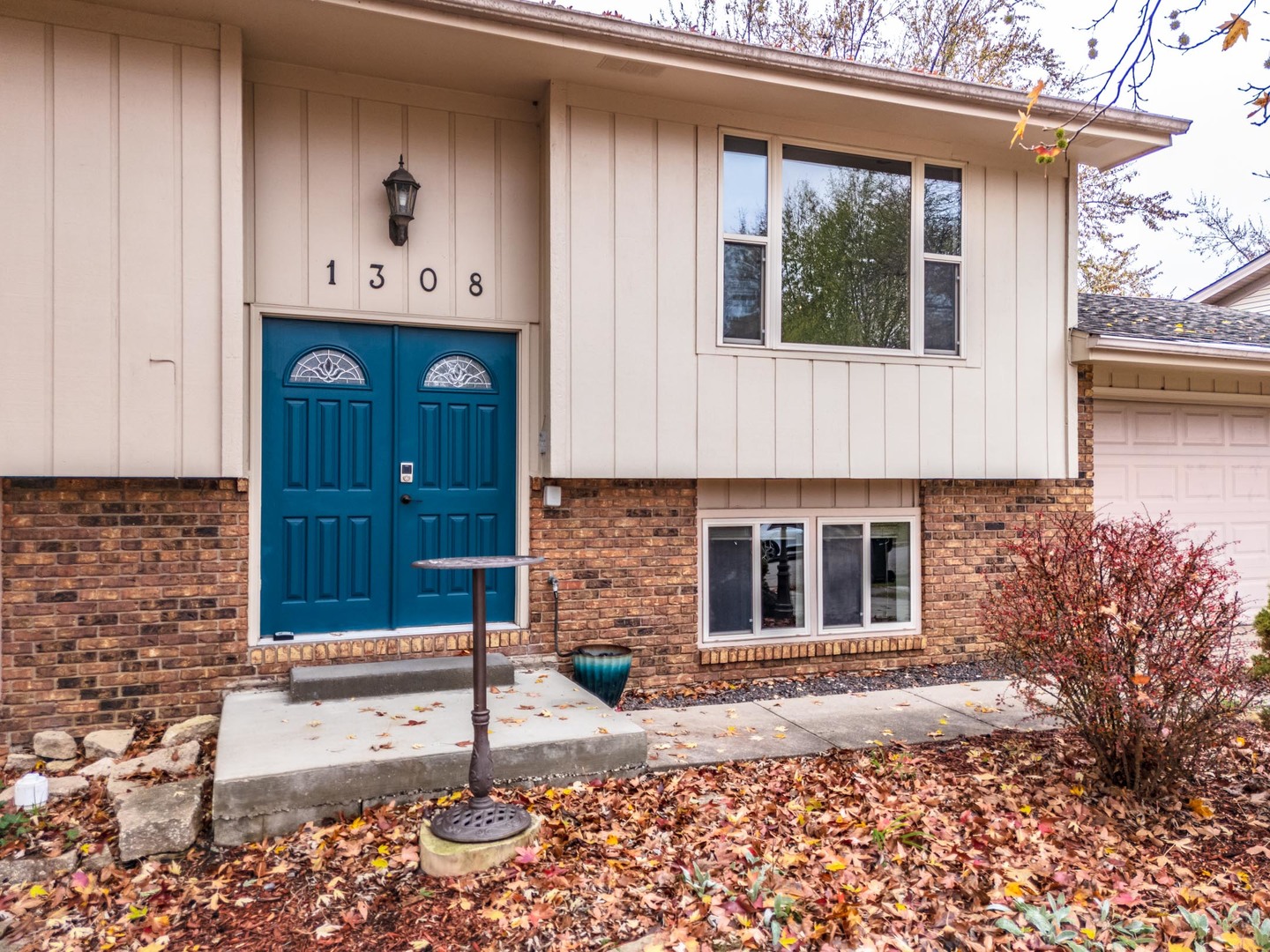 1308 Schroeder Drive Normal, IL 61761 - Photo 2 of 55 a front view of a house with garden