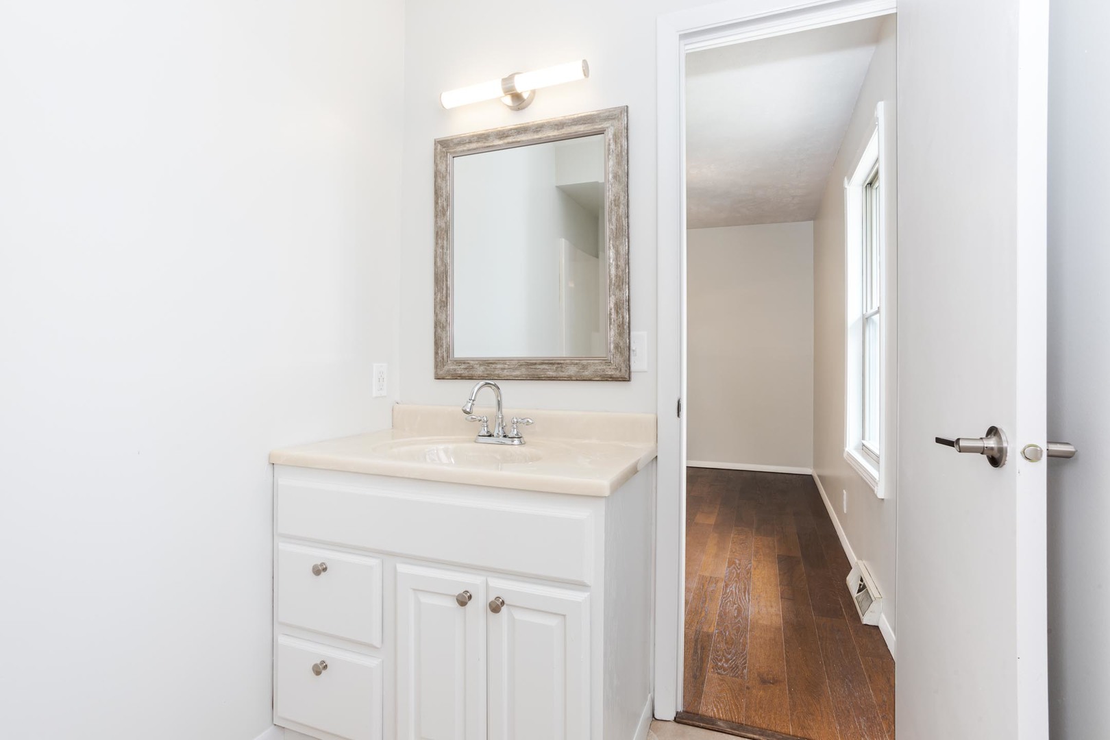 1308 Schroeder Drive Normal, IL 61761 - Photo 21 of 55 a bathroom with a sink and a mirror