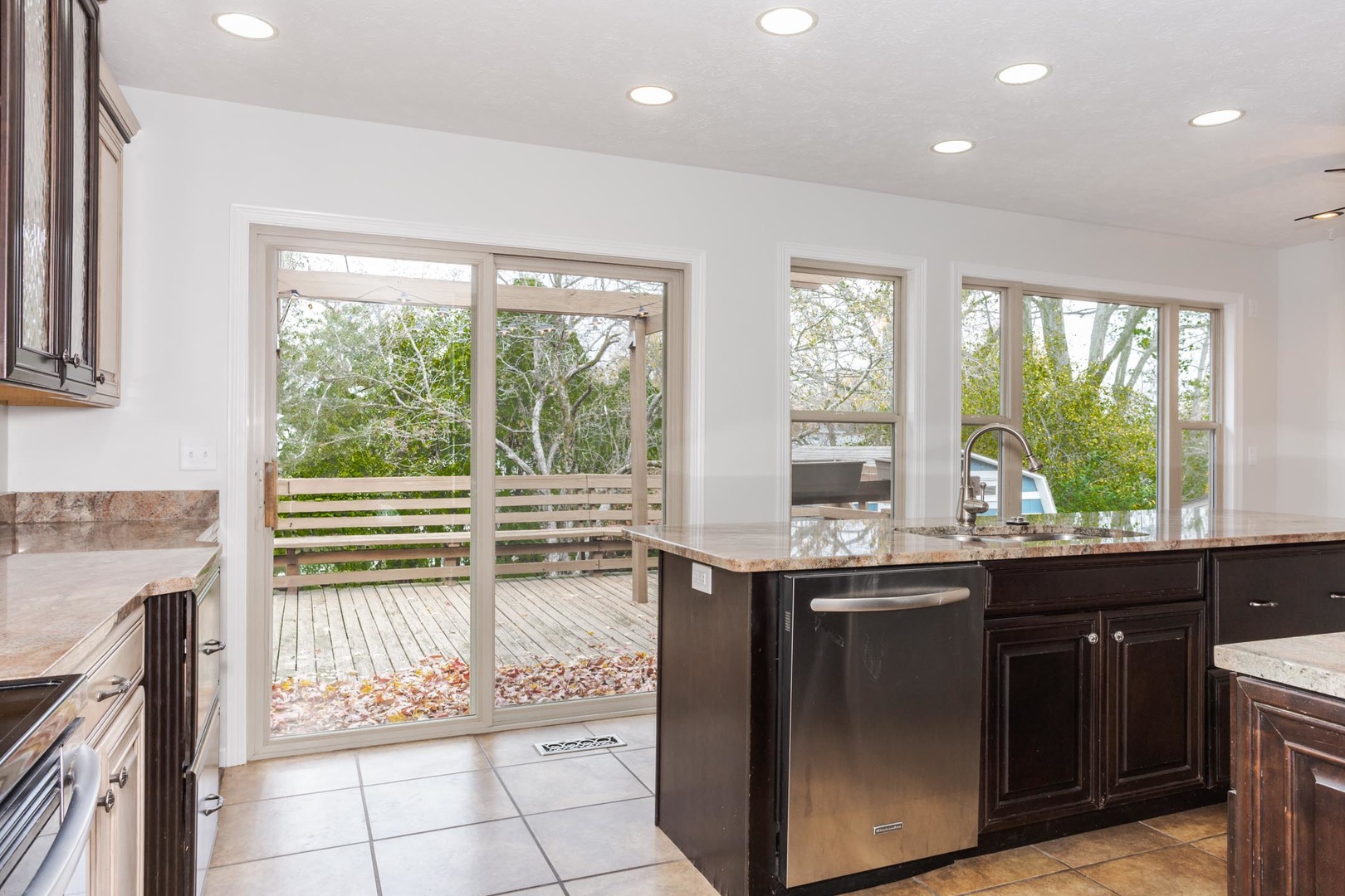 1308 Schroeder Drive Normal, IL 61761 - Photo 22 of 55 a kitchen with a sink and a stove top oven