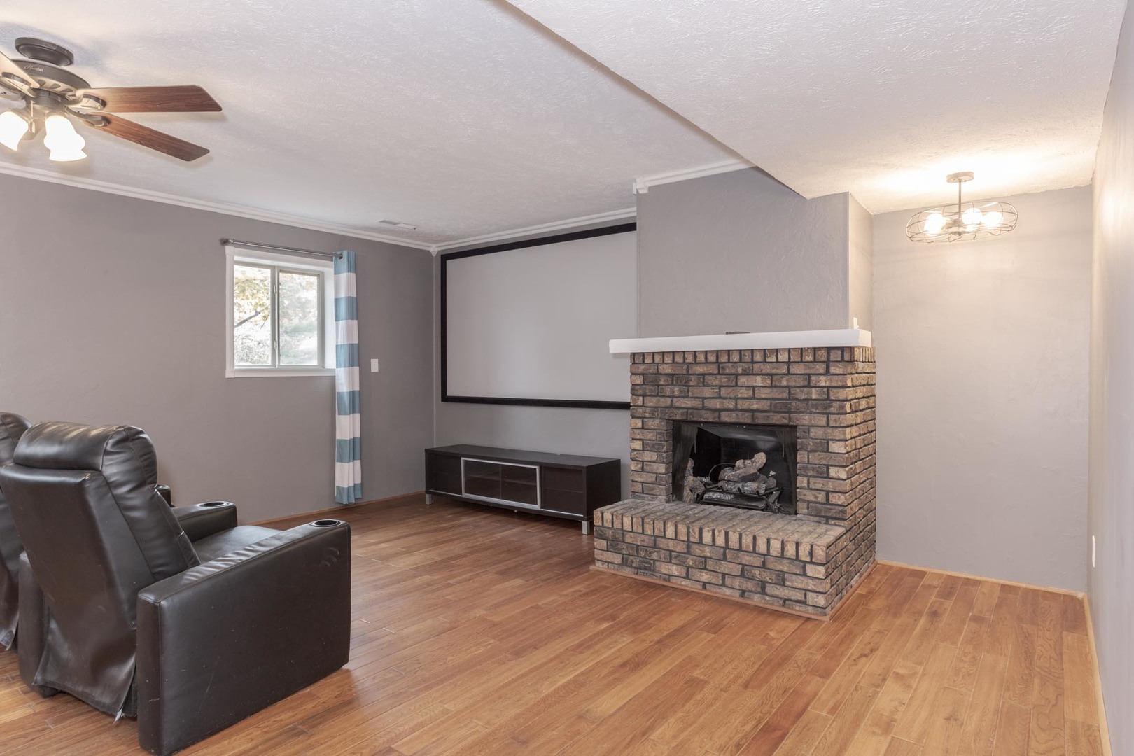 1308 Schroeder Drive Normal, IL 61761 - Photo 28 of 55 a living room with furniture and a fireplace