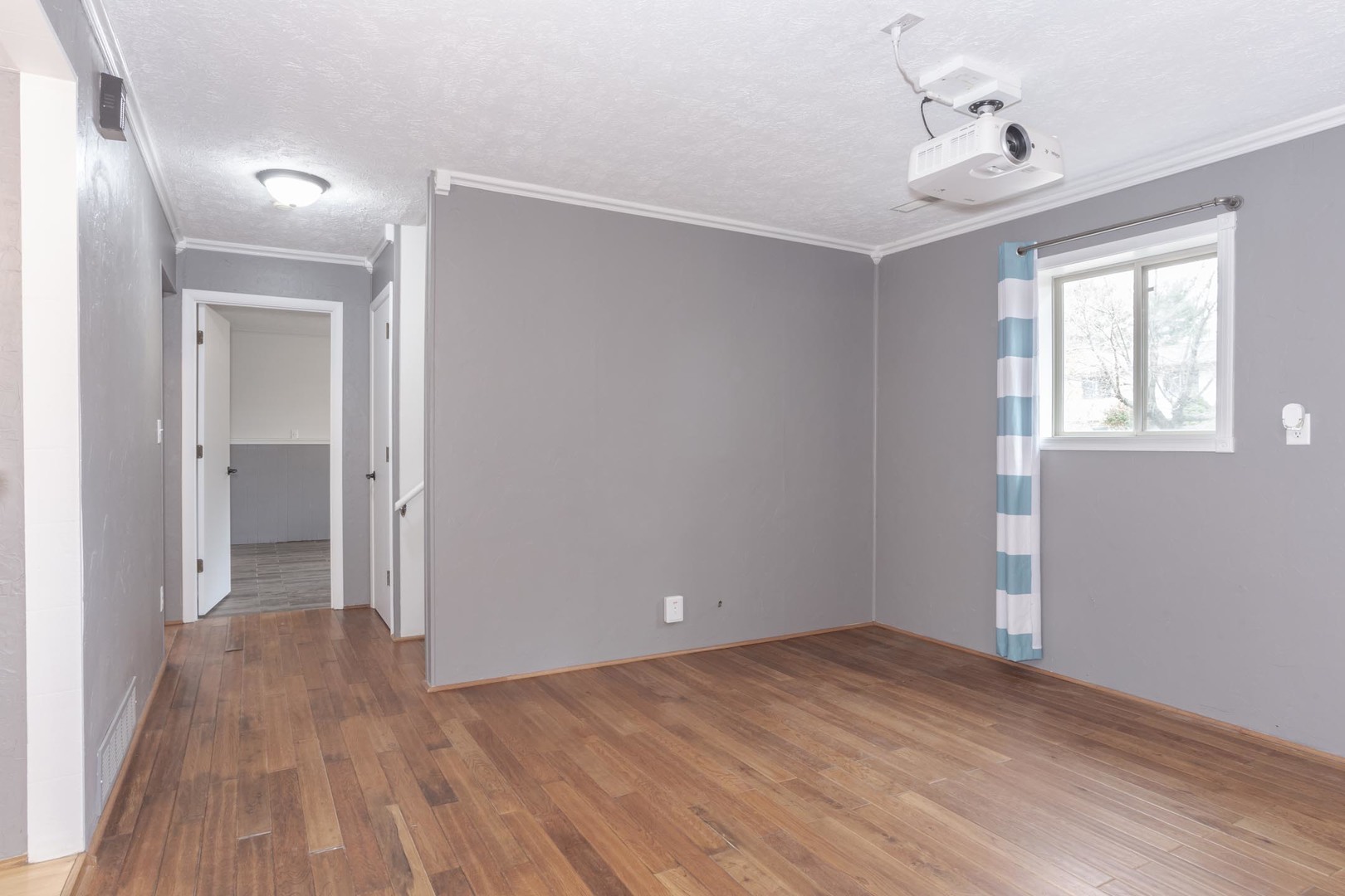 1308 Schroeder Drive Normal, IL 61761 - Photo 30 of 55 wooden floor in an empty room with a window