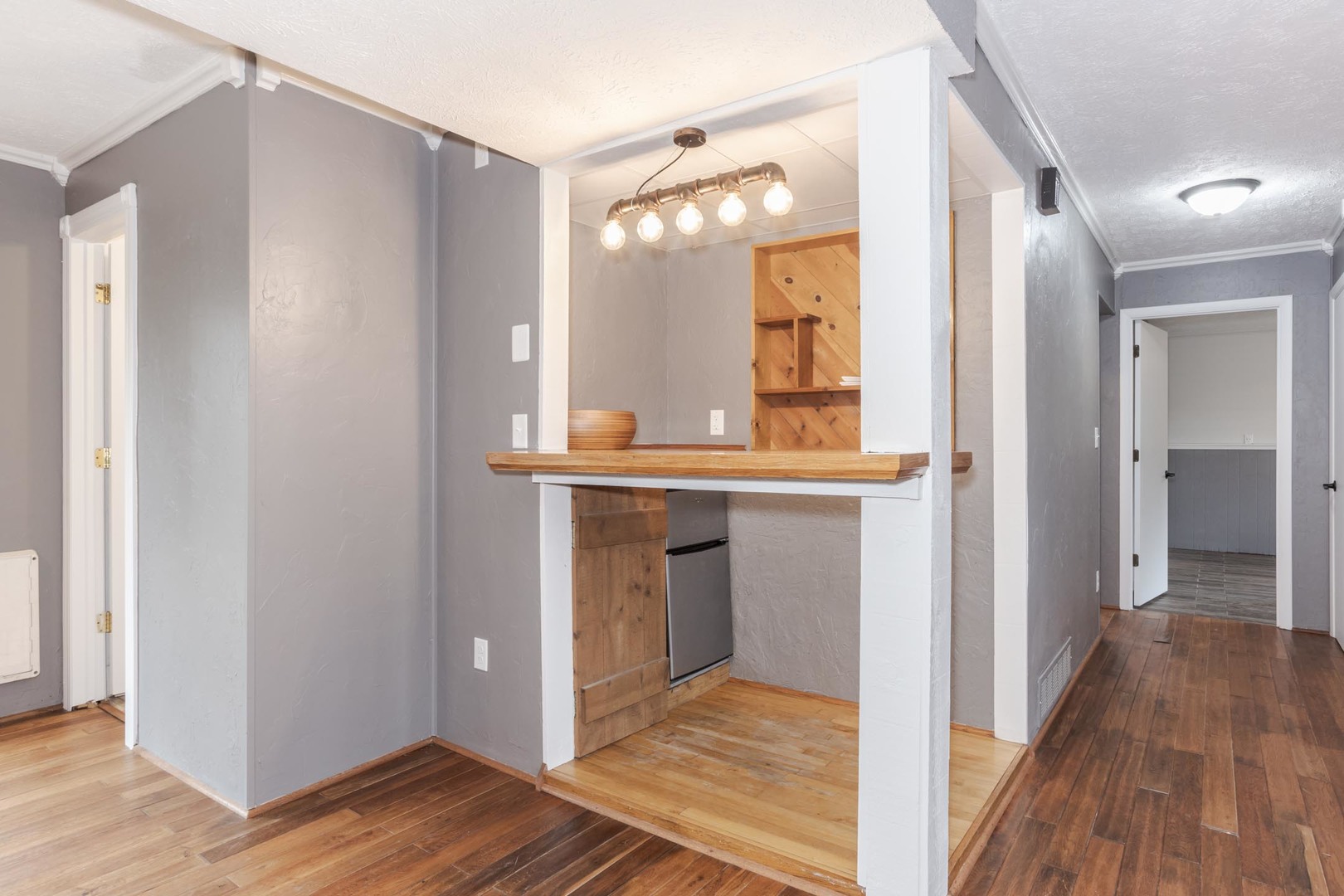 1308 Schroeder Drive Normal, IL 61761 - Photo 31 of 55 a view of hallway with wooden floor