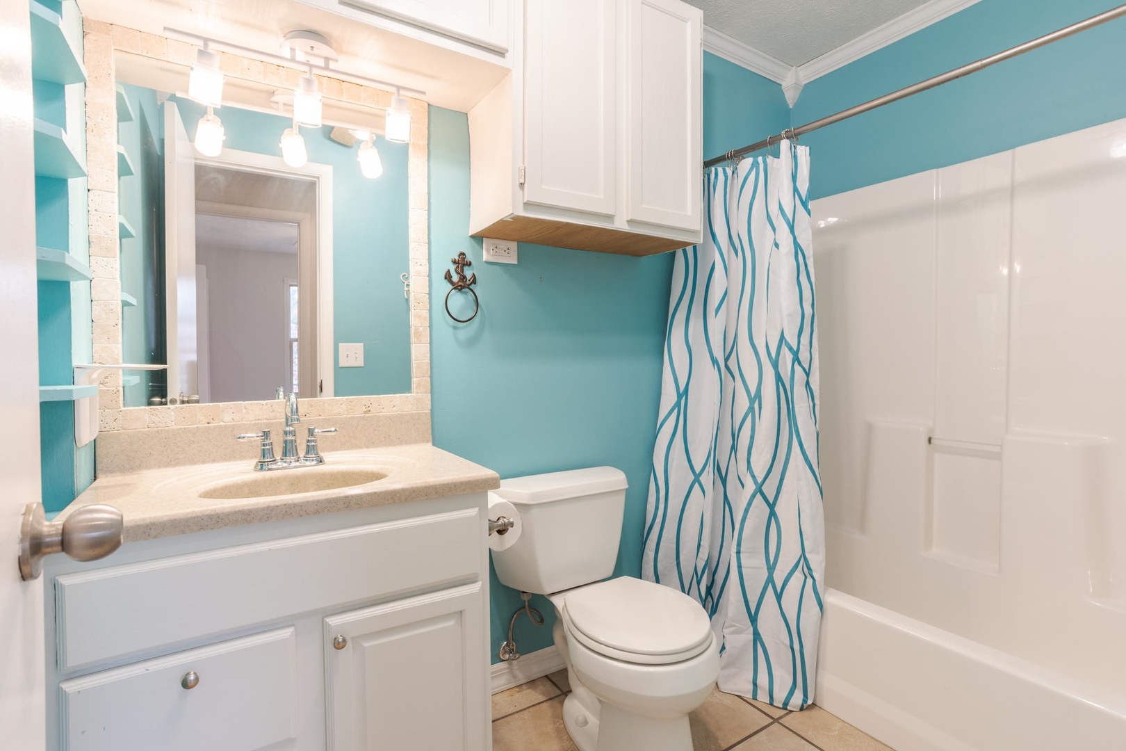 1308 Schroeder Drive Normal, IL 61761 - Photo 44 of 55 a bathroom with a sink toilet and shower