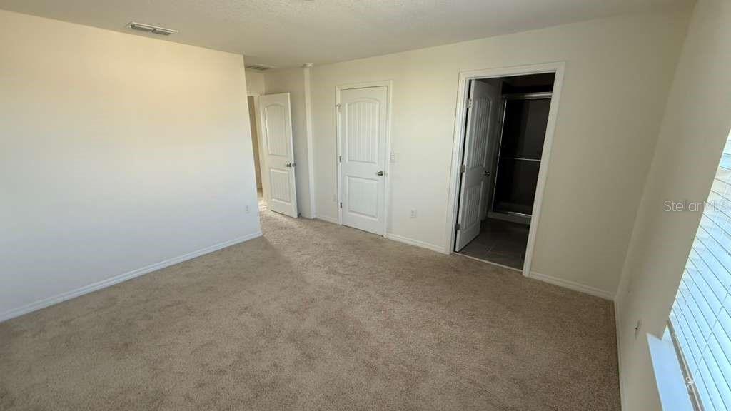 17061 Water Spring Boulevard Winter Garden, FL 34787 - Photo 11 of 17 a view of an empty room