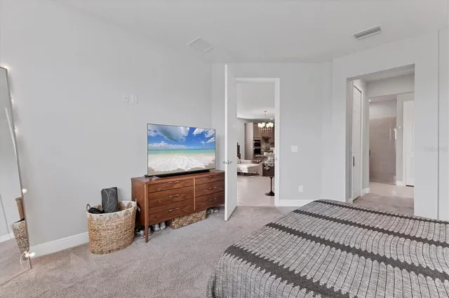a bathroom with a double vanity sink mirror and shower