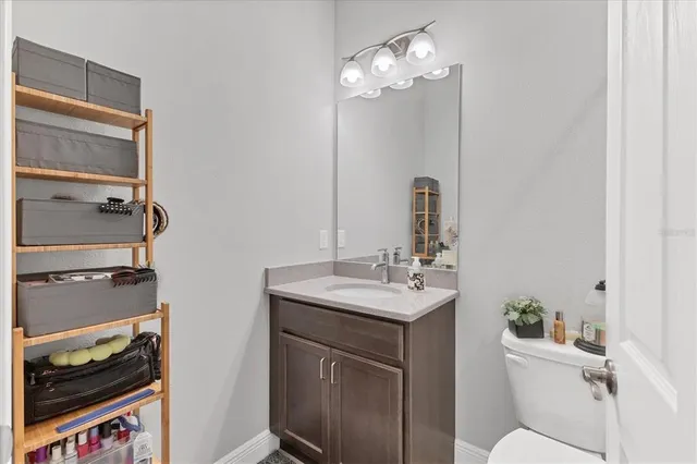a white bath tub sitting next to a white toilet
