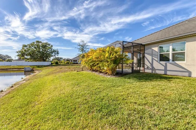 a view of a lake with a houses