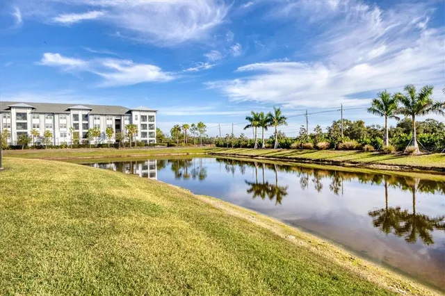 a view of a street with a sign board