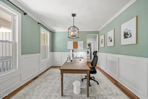 a view of a hallway with a furniture