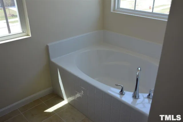 a bathroom with a bathtub
