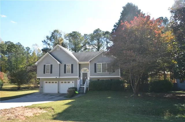 front view of house with a yard