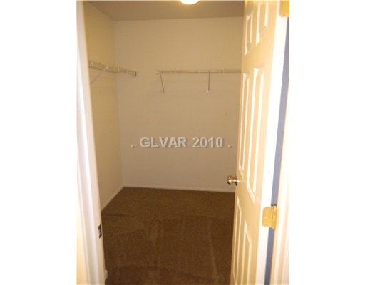9796 Ridgebluff Avenue Las Vegas, NV 89148 - Photo 17 of 21 Master Bedroom. Large walk-in closet