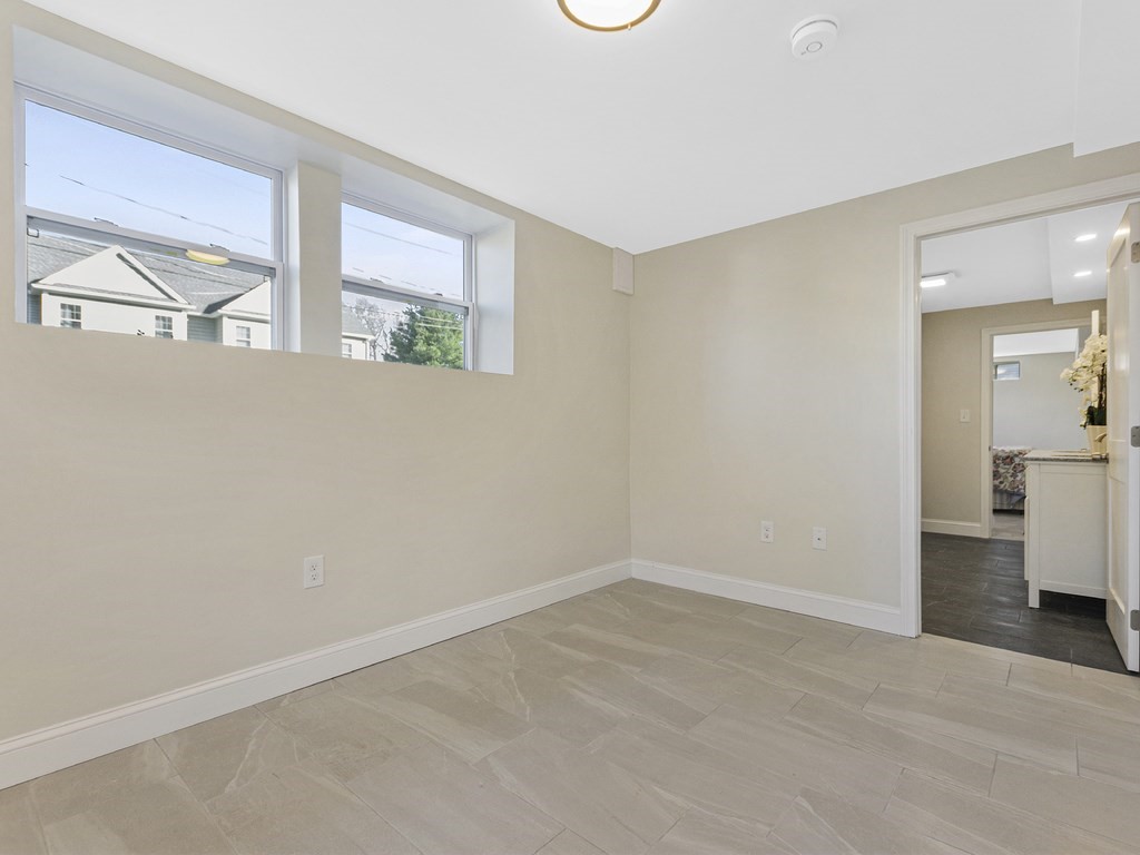 33 Line Road Reading, MA 01867 - Photo 17 of 23 a view of livingroom with furniture and window