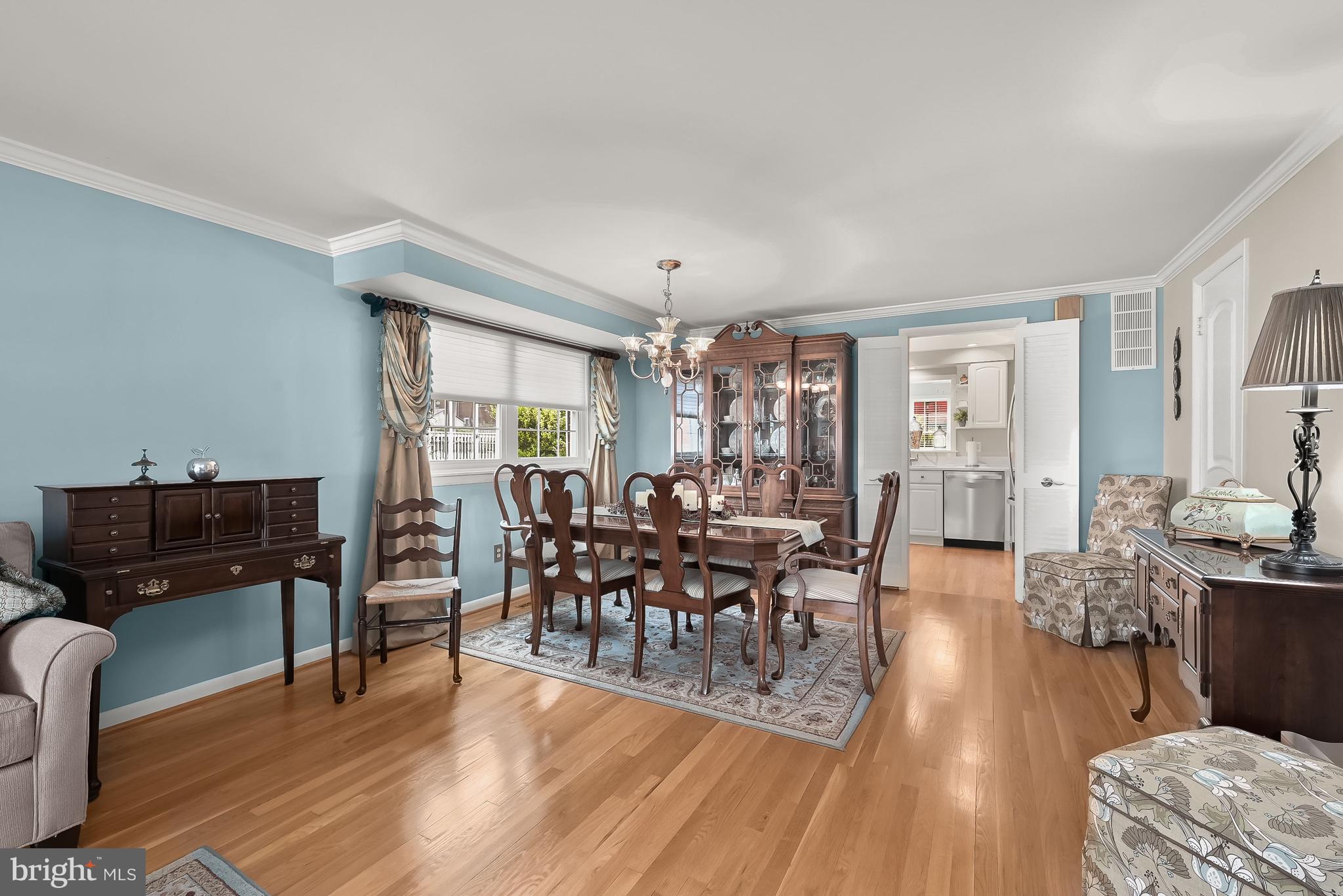 5645 Chelwynd Road Halethorpe, MD 21227 - Photo 3 of 43 Dining Room | Hardwood Floors | Classic Moldings
